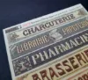 Picture of 1/35 Shop & Business Signs on Real Wood – France Set 5 – Sheet 9.5×10cm - Reality in Scale 35278
