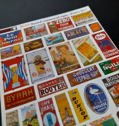 Picture of 1/35 Rusted Commercial Signs – France Set 1 – Sheet 10×14cm - Reality in Scale 35285